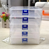 5 transparent plastic storage boxes