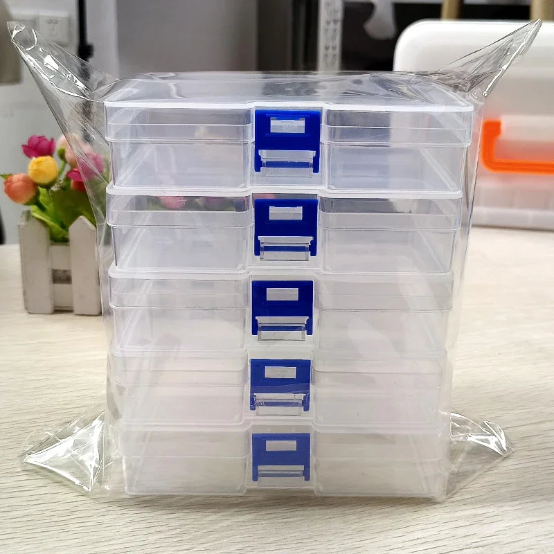 5 transparent plastic storage boxes