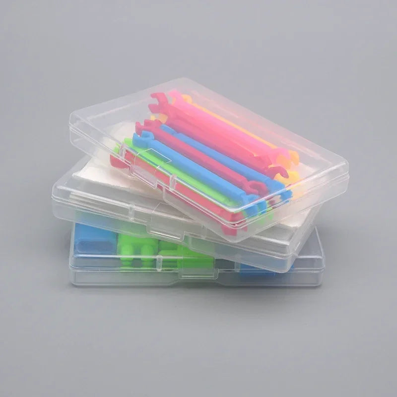 5 transparent plastic storage boxes